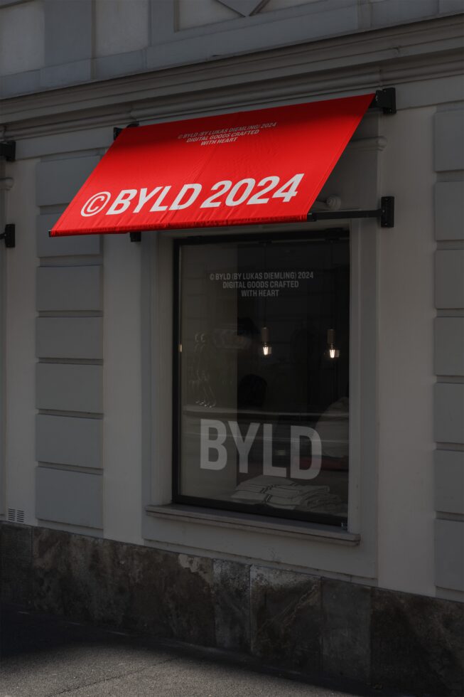 Red awning with BYLD 2024 text, storefront window below reflecting street. Ideal for mockup projects, promoting design aesthetics, urban themes.