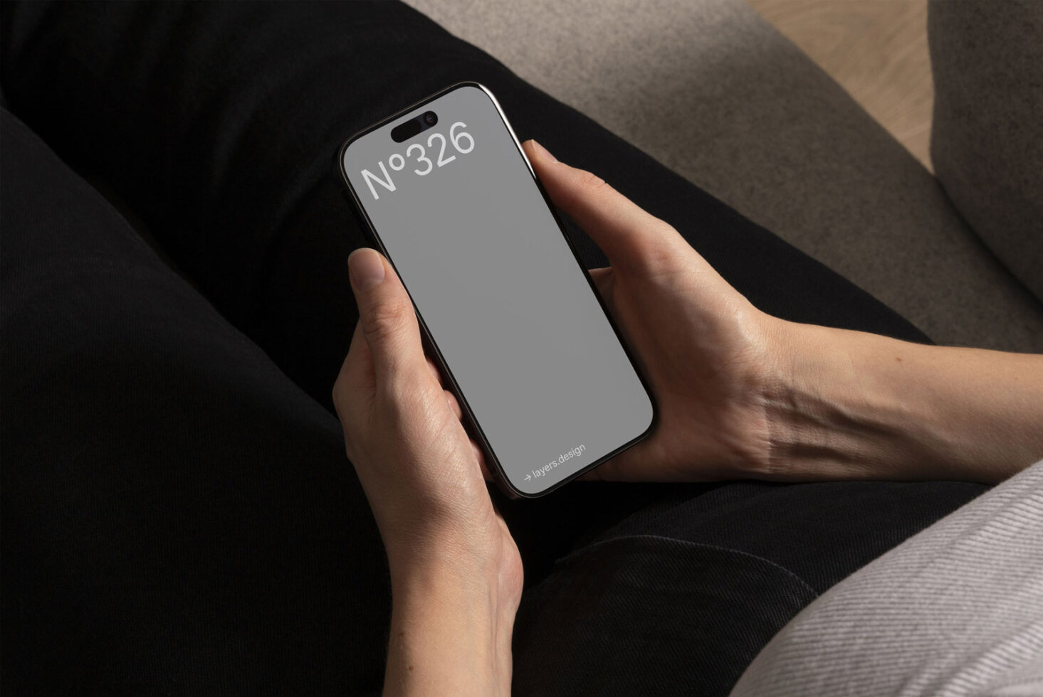 Person holding smartphone with blank screen mockup perfect for showcasing app design or branding. Ideal for designers marketing digital assets templates.