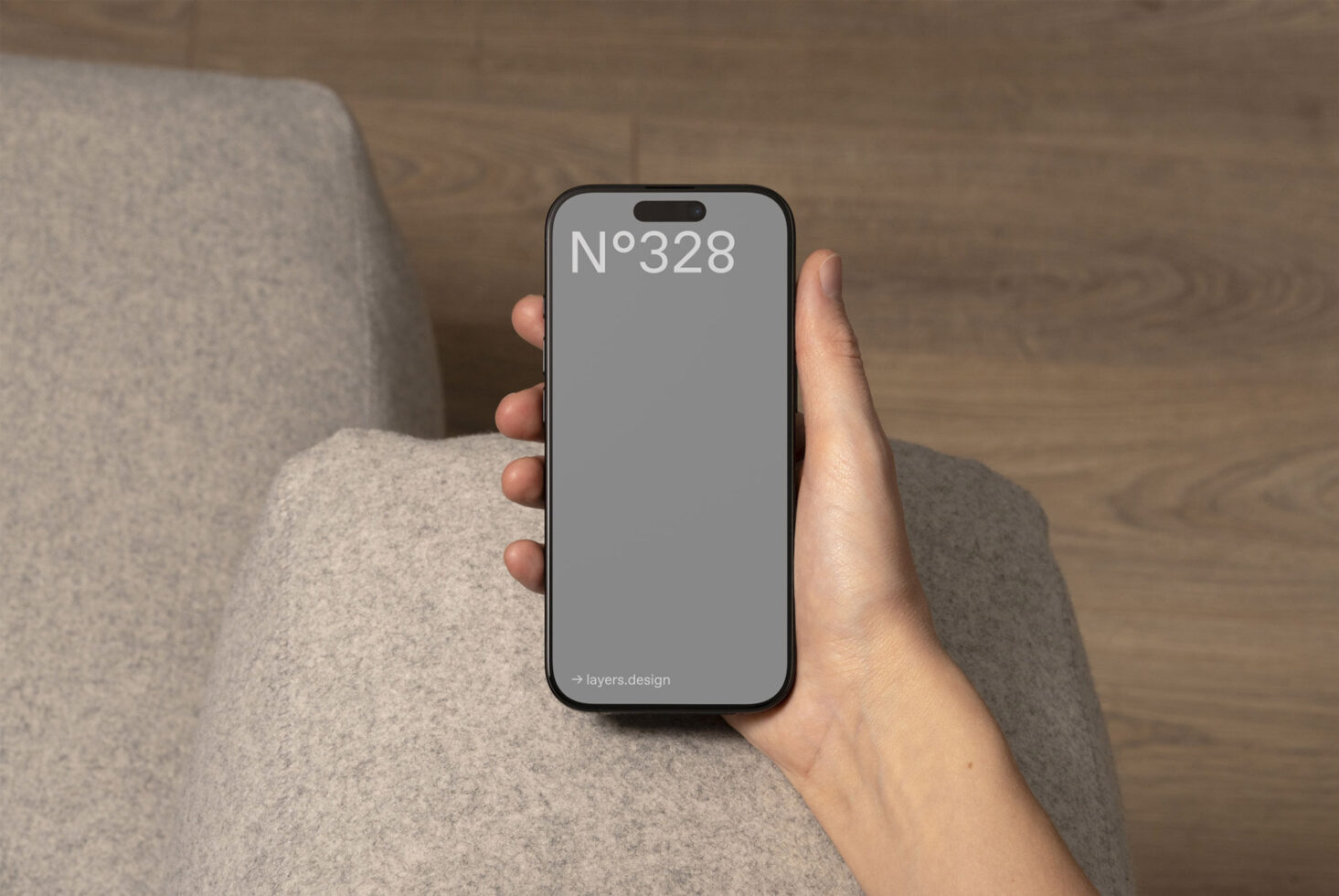 Mockup of a smartphone held in a hand with a blank screen featuring design number for app presentation and digital asset marketing ideal for designers.