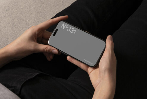 Smartphone mockup held in hands showcasing dark interface on the screen ideal for designers looking for mobile UI templates and presentation graphics