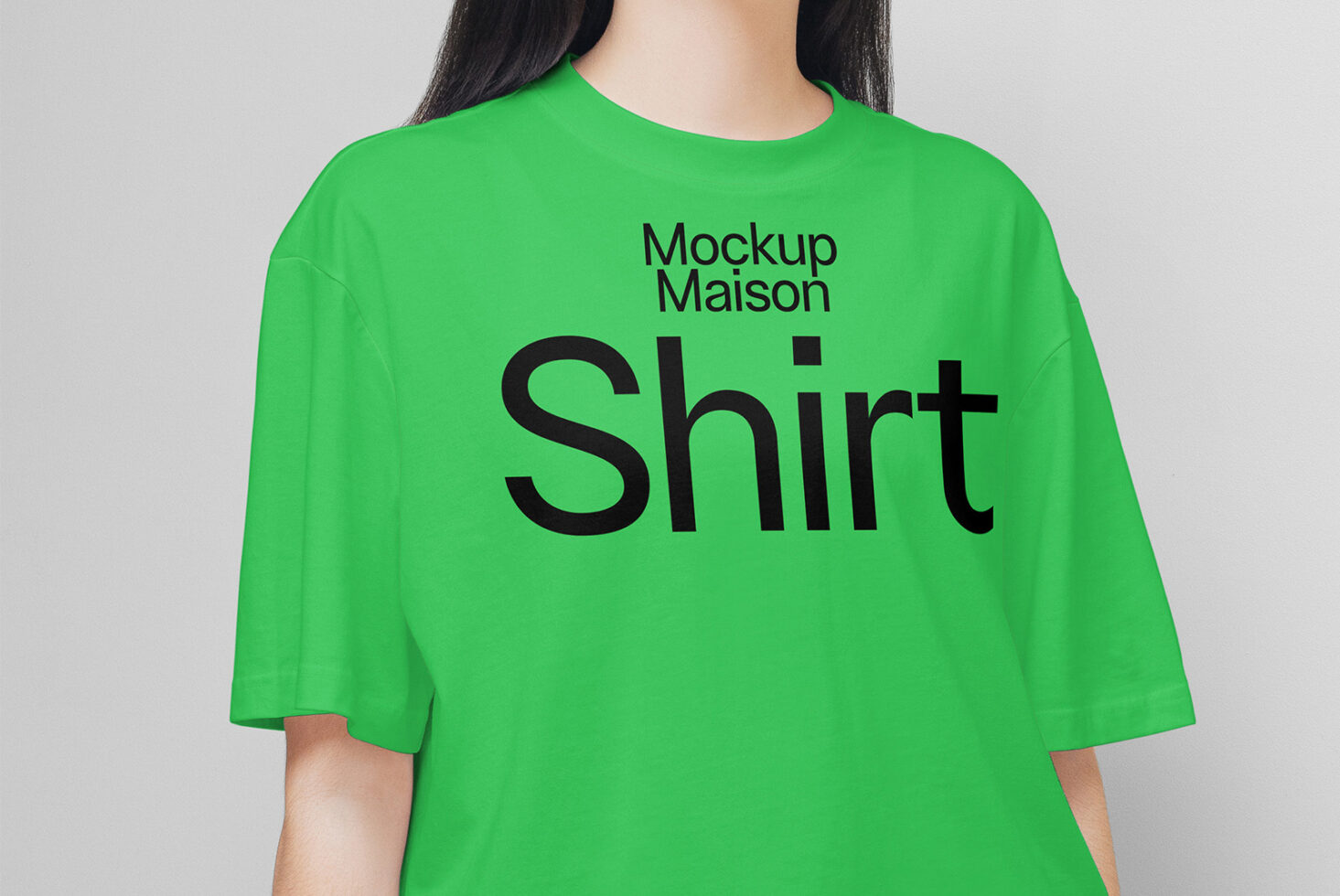 Green shirt mockup featuring bold black text suitable for designers. Perfect for showcasing t-shirt designs. Ideal for digital asset marketplace.