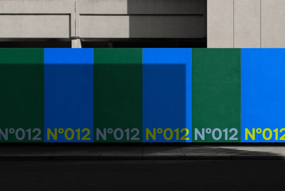 Colorful wall graphic with bold blue and green panels featuring the number 012 in modern typography, ideal for designers seeking unique visuals.