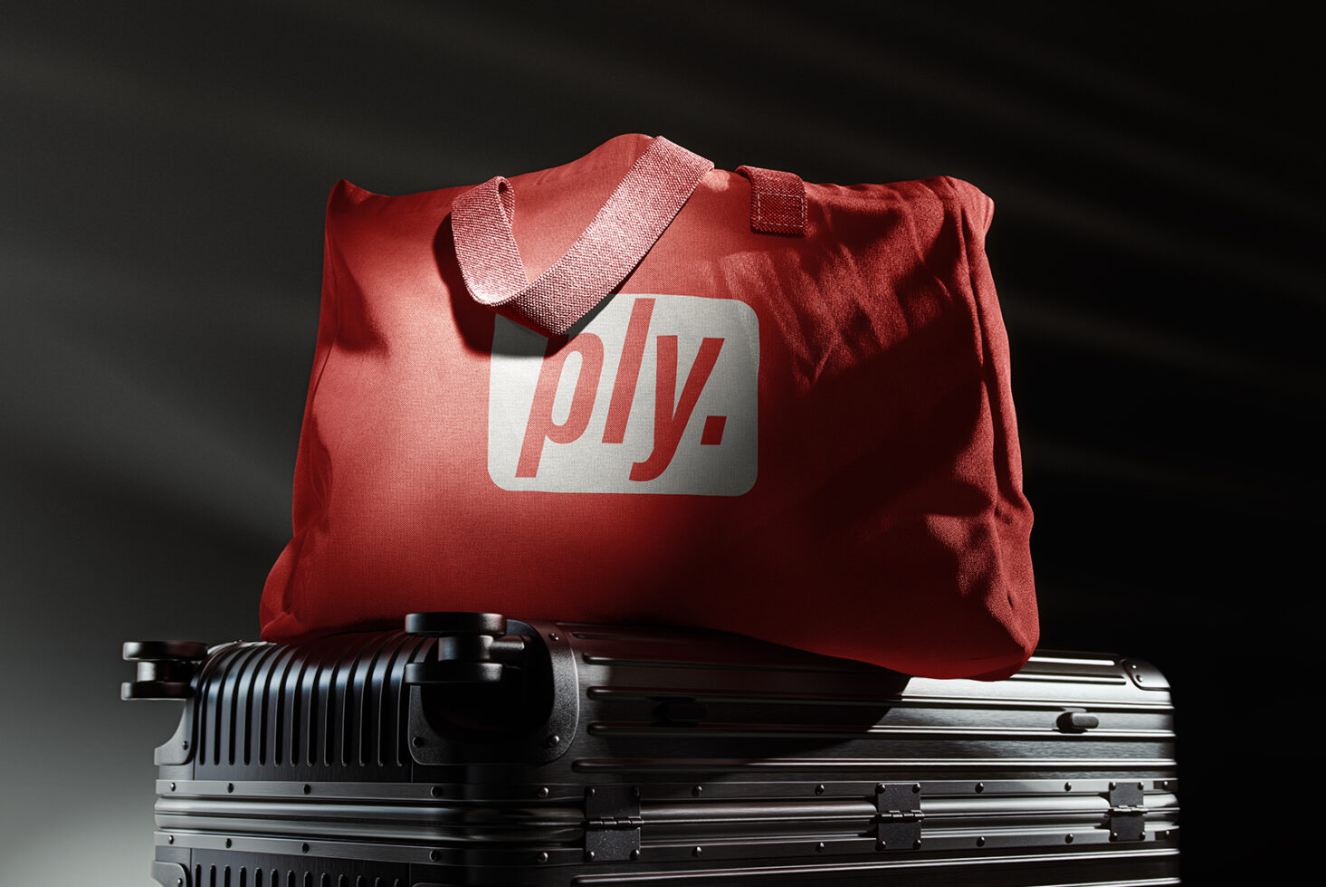 Red fabric bag with branding mockup on metal suitcase. Perfect for design portfolios and showcasing branding concepts to graphic designers and creatives.