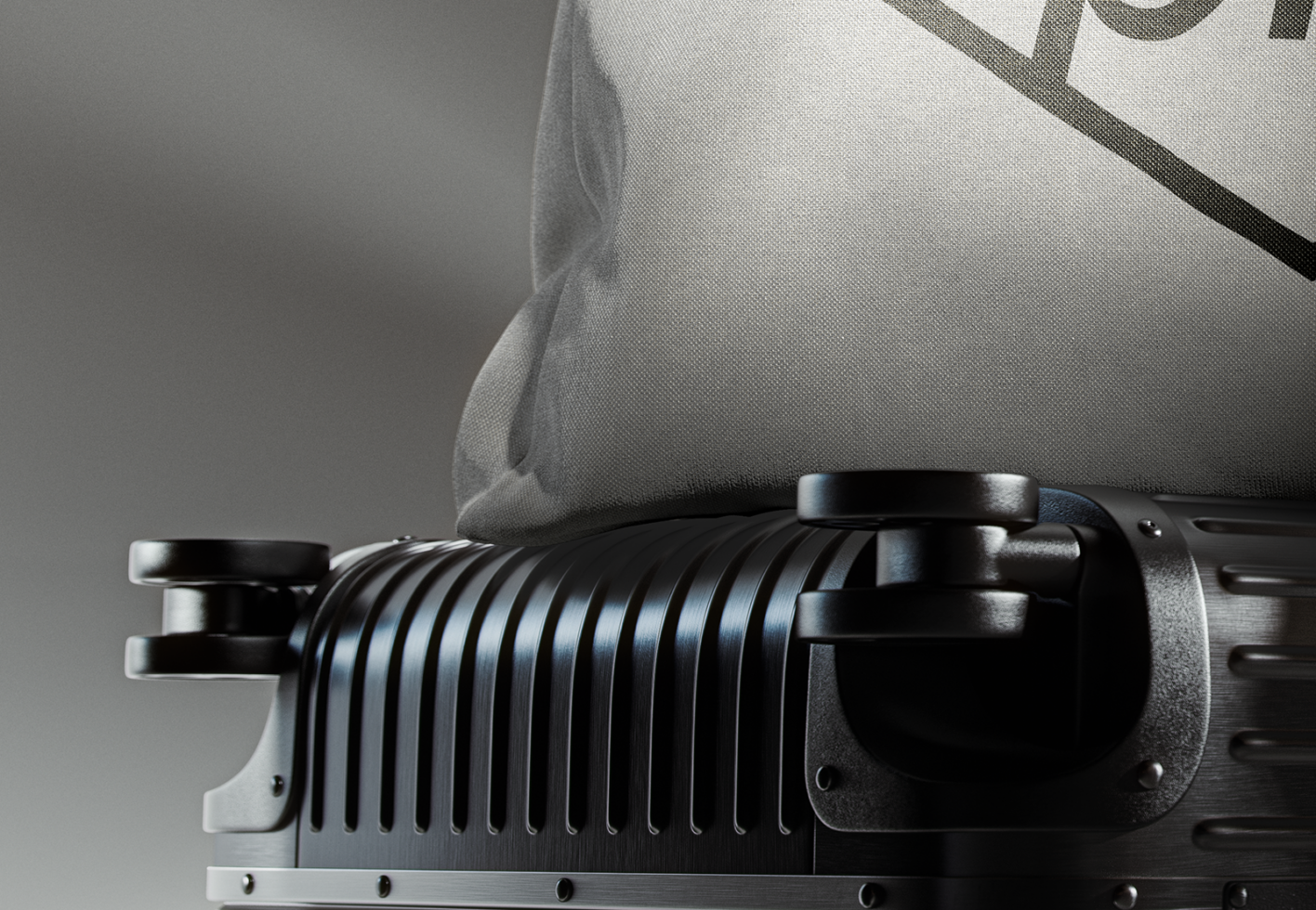 Close-up of a black suitcase with textured canvas bag on top ideal for designers creating product mockups luggage branding and texture design assets.