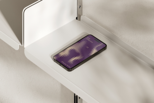 Mockup of an iPhone 14 Pro on a white shelf with a vibrant purple 90s-themed graphic screen. Ideal for showcasing phone designs and app interfaces.