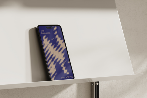 Modern iPhone 14 Pro mockup leaning on a minimalist shelf with abstract blue and beige screen design. Ideal for digital assets designers and SEO graphics.