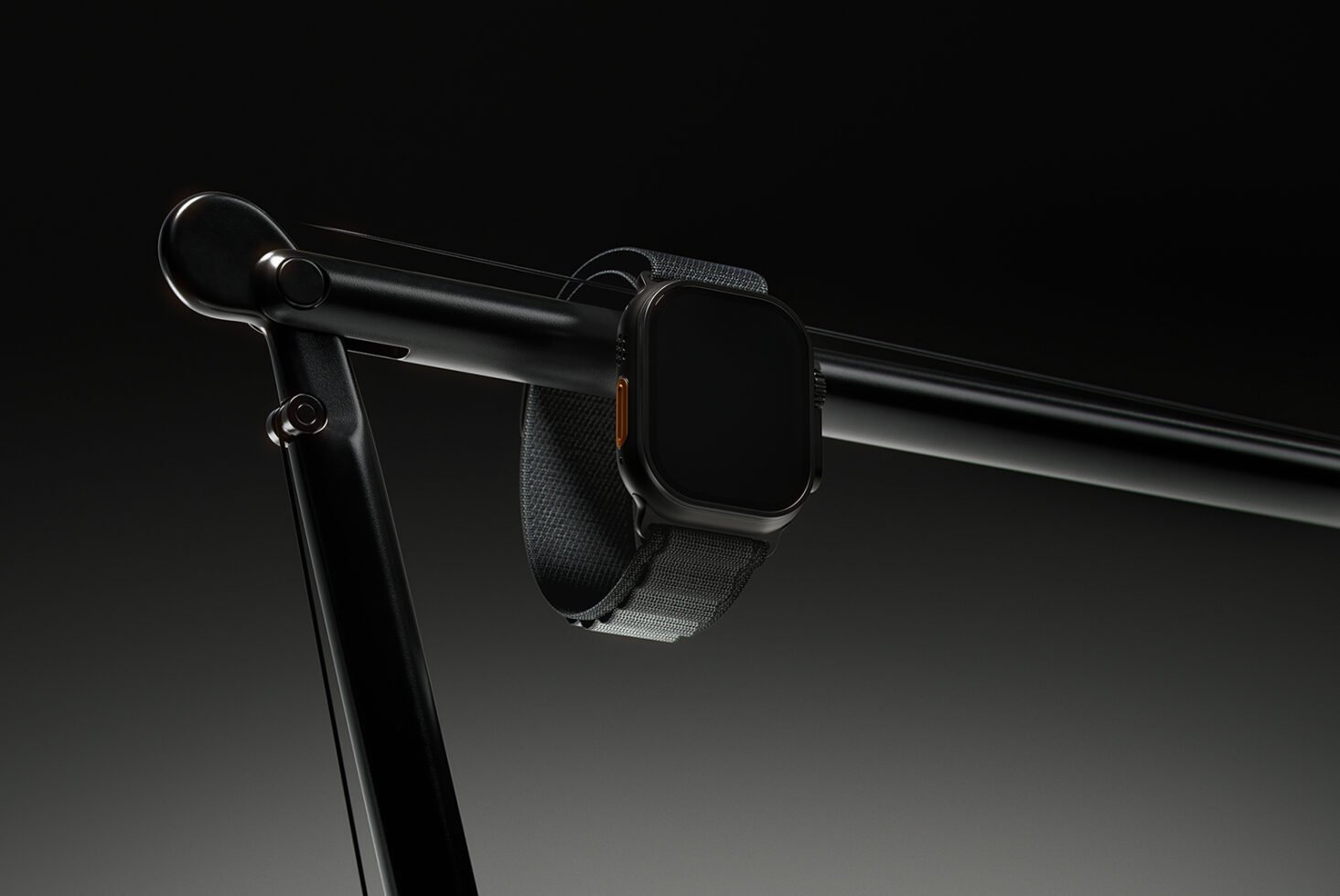 Dark mockup of a smartwatch hanging on a black metal stand suitable for designers. Minimalistic design with a focus on modern tech accessories.