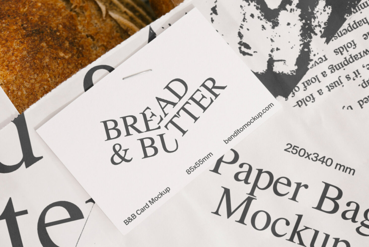 Paper bag mockup featuring a bread loaf and a Bread and Butter card for label design presentation. Ideal for packaging and branding designers.