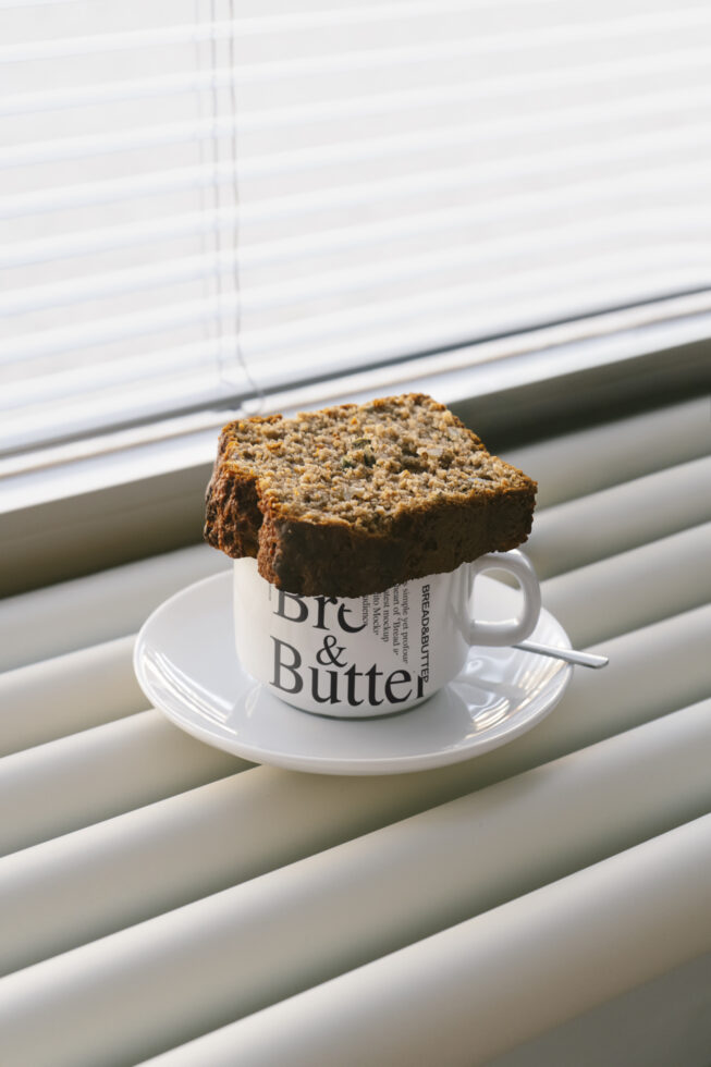 Sliced bread on a coffee cup with bold typography design settings. Perfect for designers exploring graphic design, typography, and branding mockups.