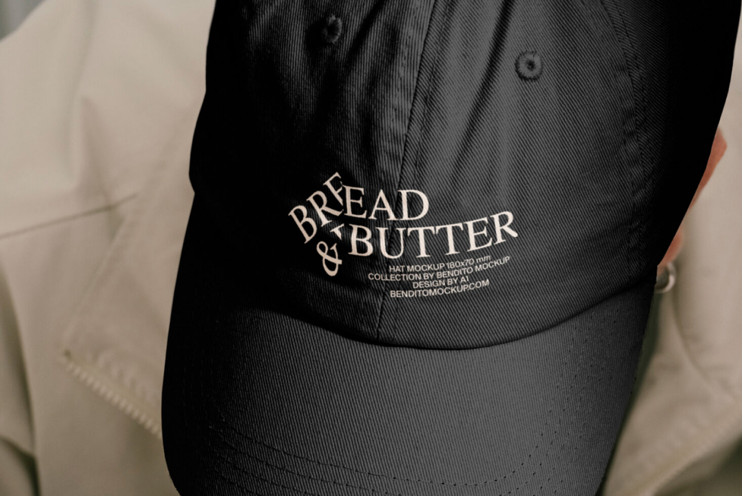 Black cap mockup with Bread and Butter text embroidery design perfect for showcasing your graphic design expertise in fashion accessories templates.