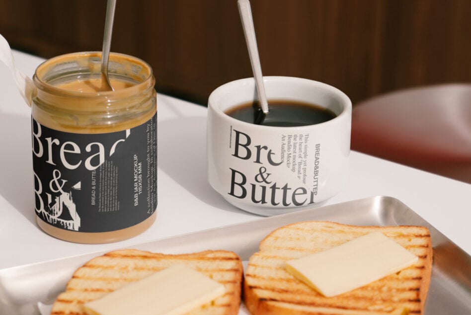 Bread butter branding on black jar, white mug with coffee, crackers with cheese