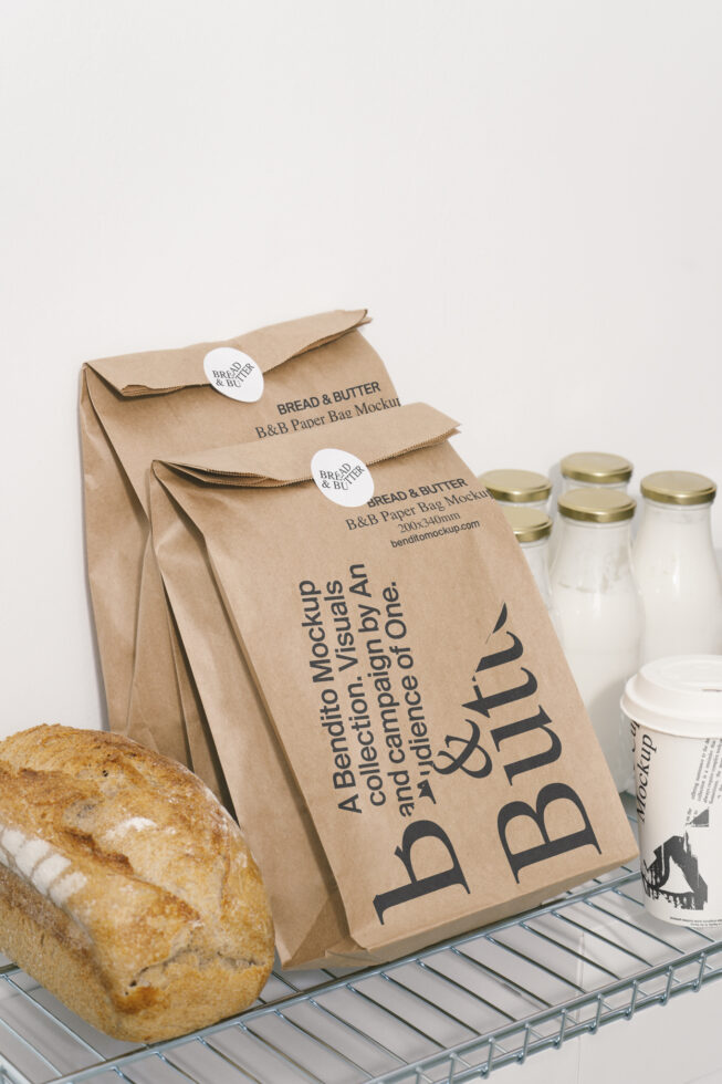 Paper bag mockup featuring bread and dairy products on a metal shelf. Perfect for packaging design, branding mockups. Ideal asset for designers.