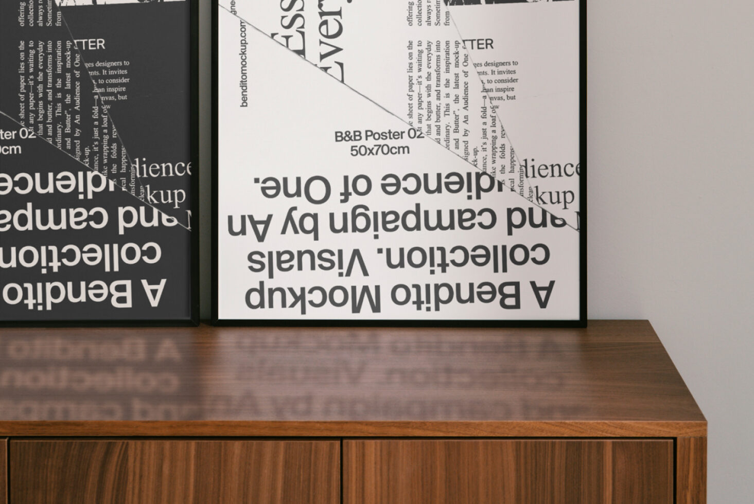 A stylish poster mockup featuring modern typography in black and white, framed and placed on a wooden cabinet, perfect for design presentations.