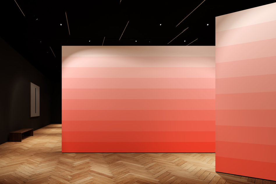 Modern gallery mockup with minimalist design featuring gradient pink walls and wood flooring ideal for creative presentations and interior design concepts.