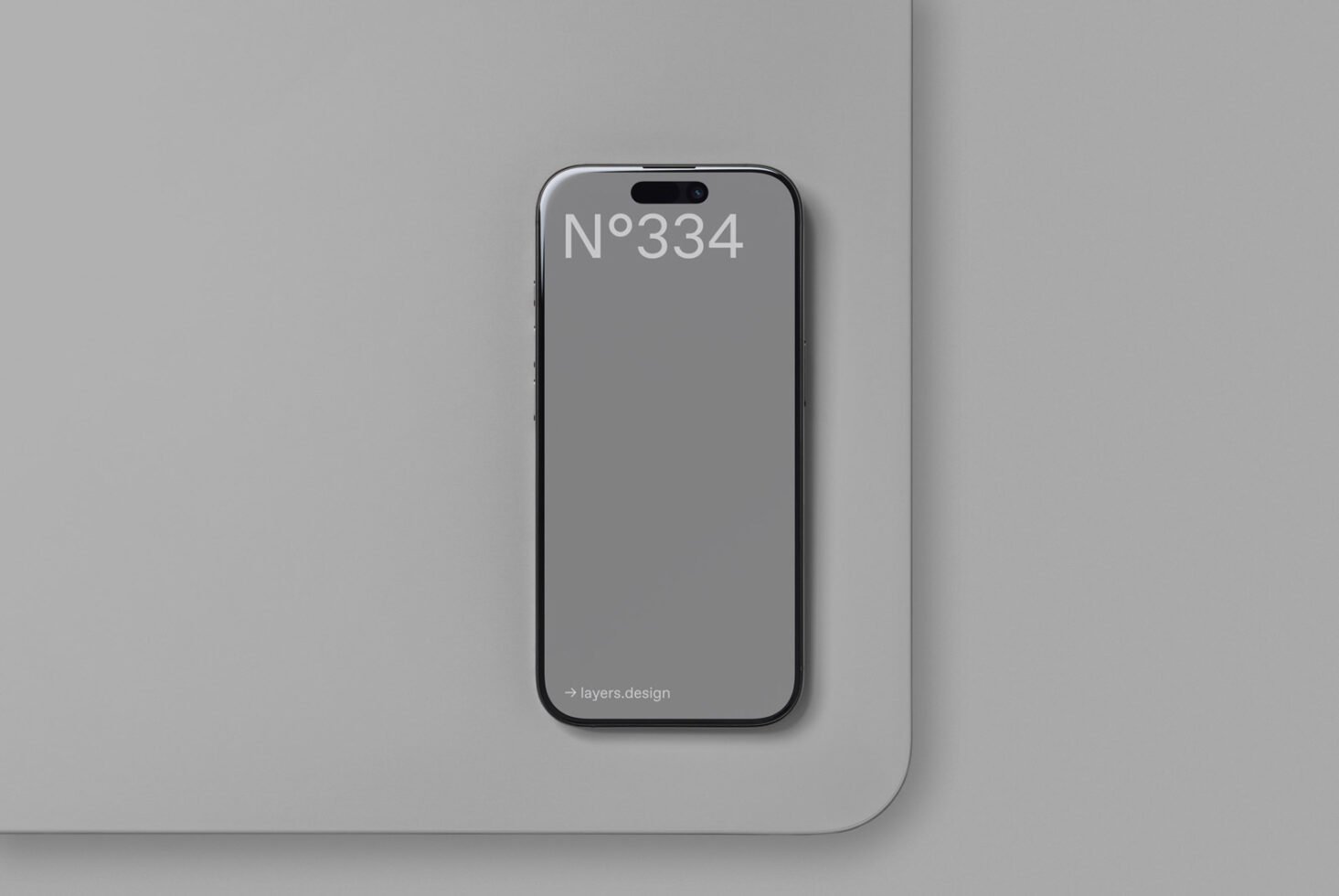 Minimalist smartphone mockup on a gray background ideal for digital designers. Use this for showcasing apps, UI design, and responsive web templates.