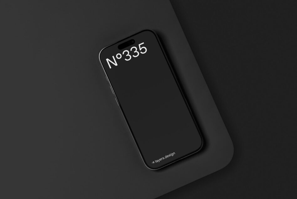 iPhone 14 Pro mockup on dark gray background, centered overhead view