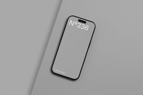 iPhone mockup on gray surface showcasing minimalist design ideal for presentations digital assets templates mobile app designers UI UX projects layer design