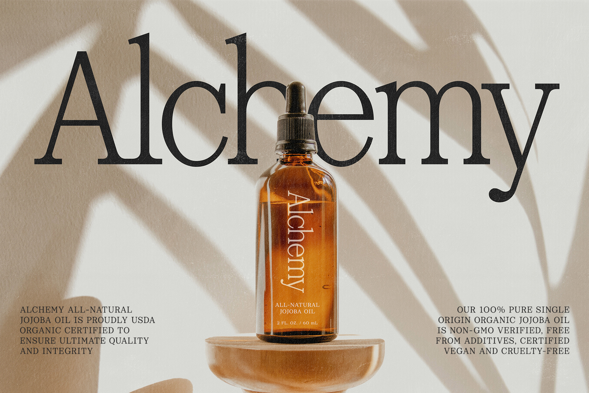 Glass bottle of Alchemy all-natural jojoba oil on neutral background with bold typography. Organic skincare product packaging mockup for designers.