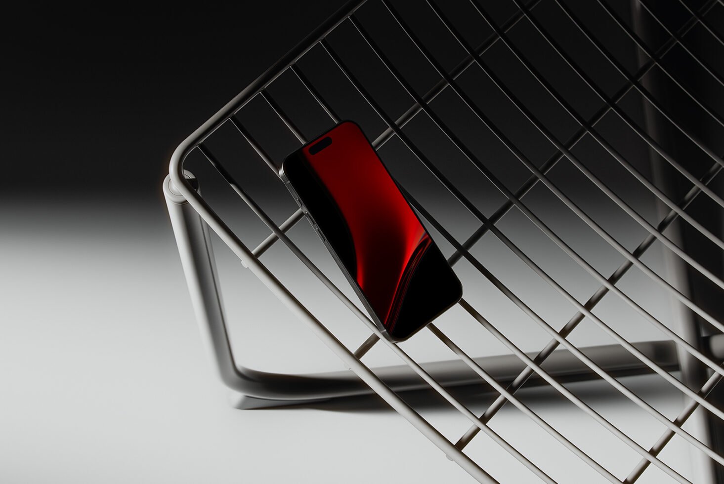 Minimalistic smartphone mockup on a wireframe chair, featuring sleek design and dark red screen. Ideal for designers creating digital product presentations.
