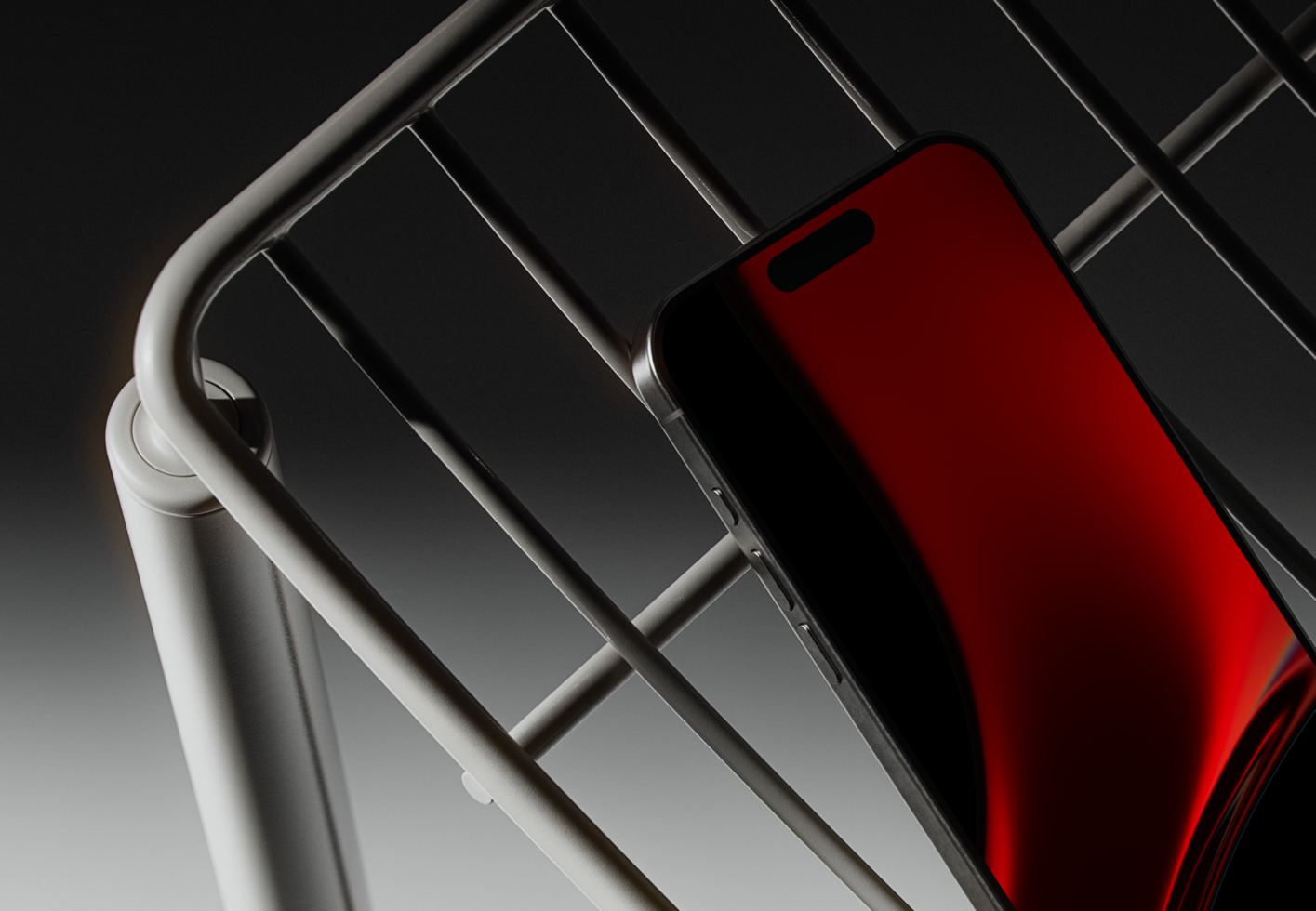 High-resolution smartphone mockup with a sleek red screen placed on a metal rack perfect for designers seeking modern technology graphics and templates.