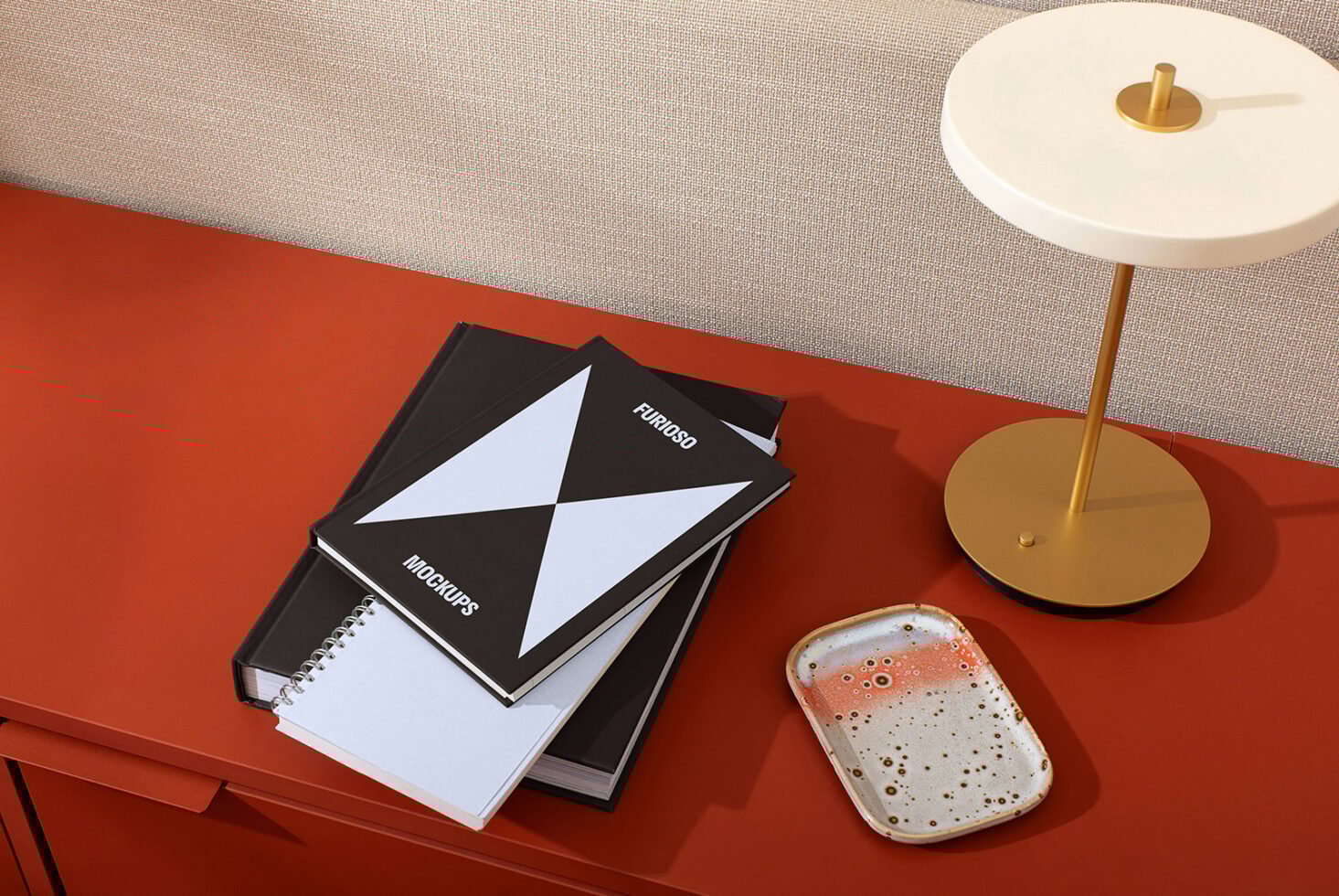 Modern mockup workspace scene with red desk lamp books notebook and decorative tray. Ideal for designers seeking stylish mockup templates.