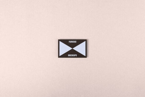 Business card mockup on a beige background for graphic designers featuring minimalistic design and branding elements. Ideal for showcasing card designs.
