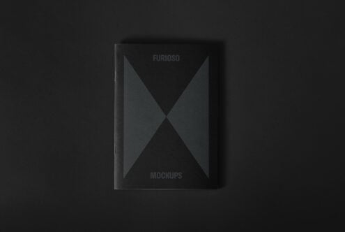 Dark book cover mockup on a black background showcasing sleek design for digital assets marketplace. Ideal for designers. Keywords: mockup, design, template.
