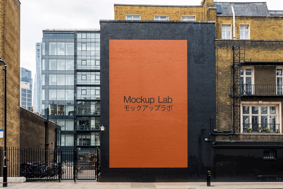 Urban building facade with large mockup lab wall perfect for showcasing design templates in city settings ideal for graphic designers and template creators.