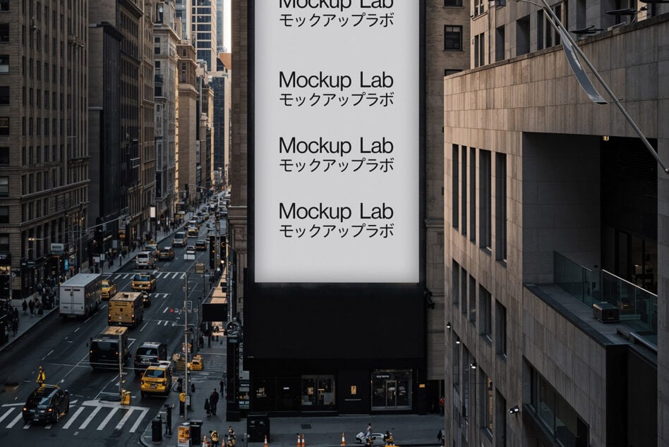 Daytime billboard mockup on city block with repeating text, yellow taxis below