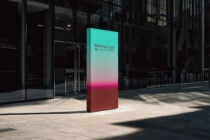 Outdoor signage mockup in urban setting with gradient design. Ideal for designers showcasing templates. Keywords: mockup, signage, urban, templates.