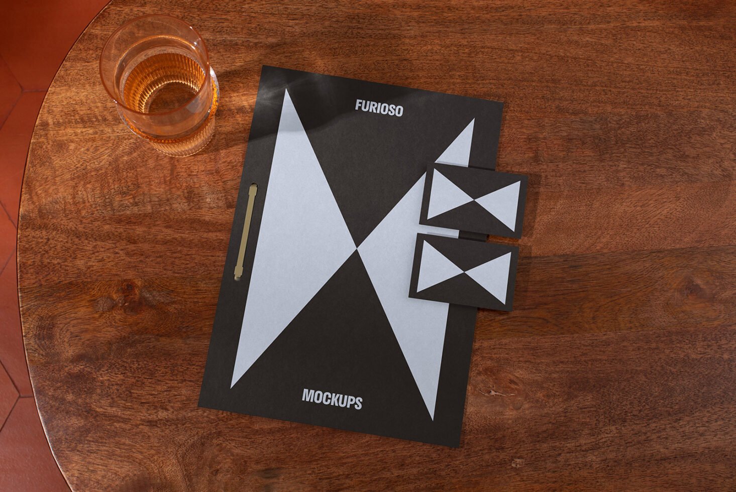 Elegant branding mockup featuring stationery design with geometric patterns on a wooden table perfect for designers seeking creative business identity assets.