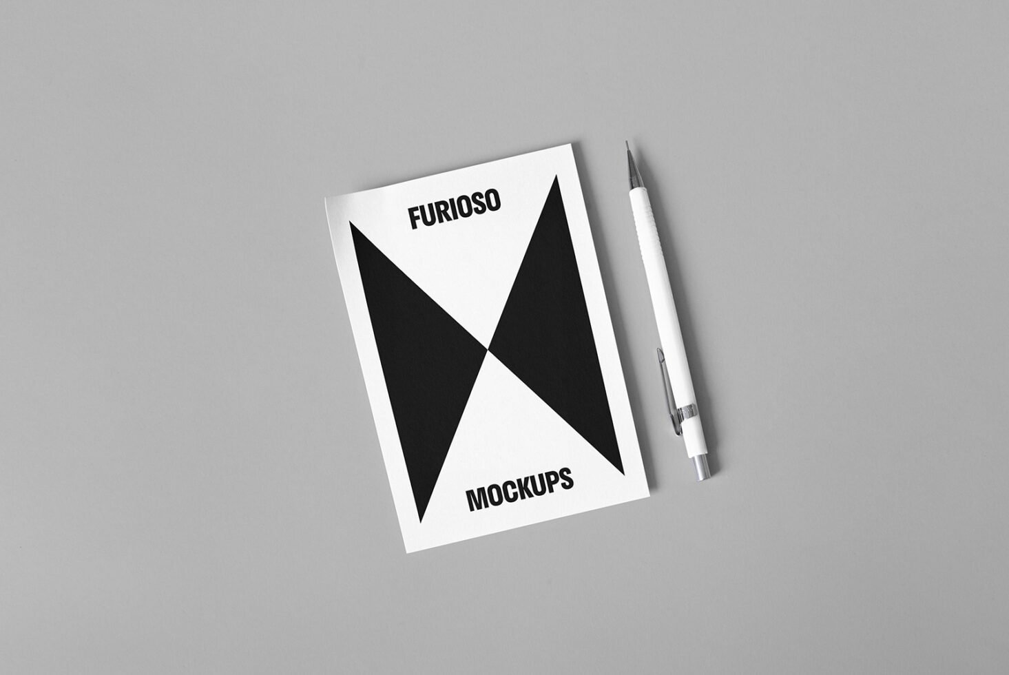 Minimalist mockup of a geometric design flyer and white pen on gray background. Ideal for showcasing print templates and graphic design layouts.