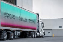 White truck with turquoise to pink gradient wrap displaying Mockup Lab text