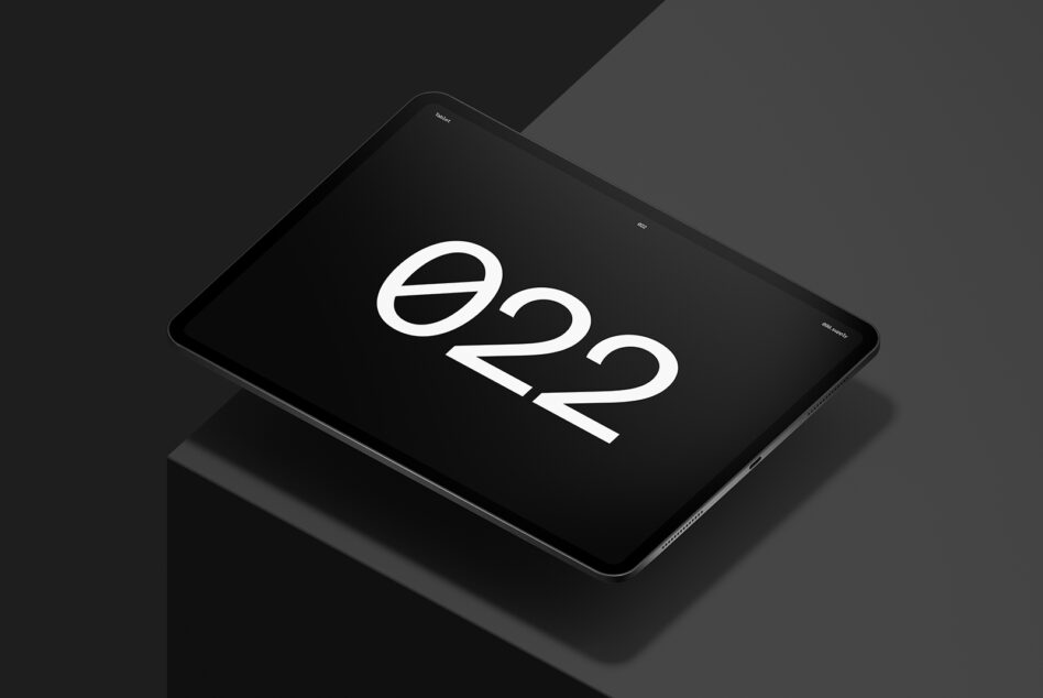 Dark tablet display with bold white number two geometric logo centered