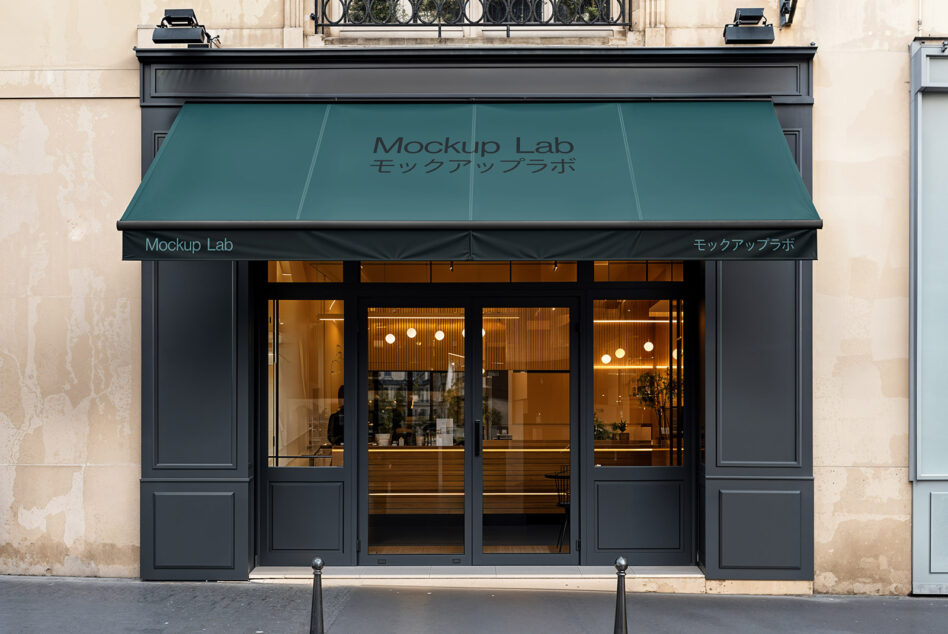 Teal storefront awning mockup on elegant Parisian building with lit interior