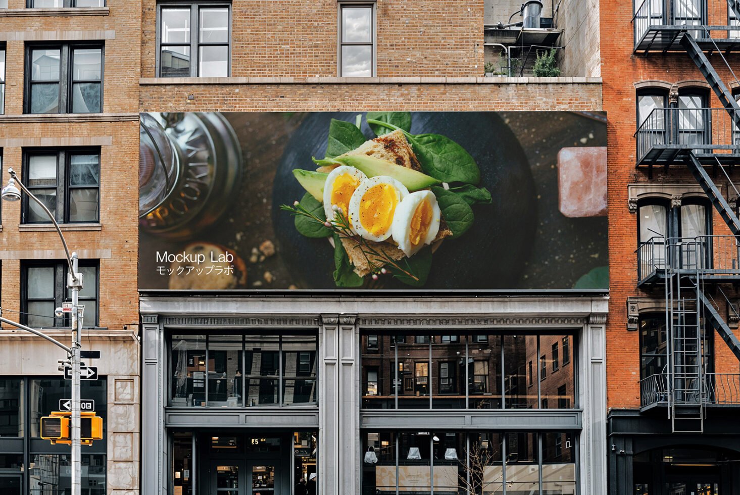 Urban city building features a large outdoor mockup displaying a detailed food photograph. Ideal for designers needing realistic food advertisement templates.