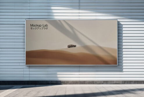 Large outdoor billboard mockup featuring a car in a desert landscape. Perfect for showcasing advertising designs. Keywords: billboard, mockup, design, outdoor.