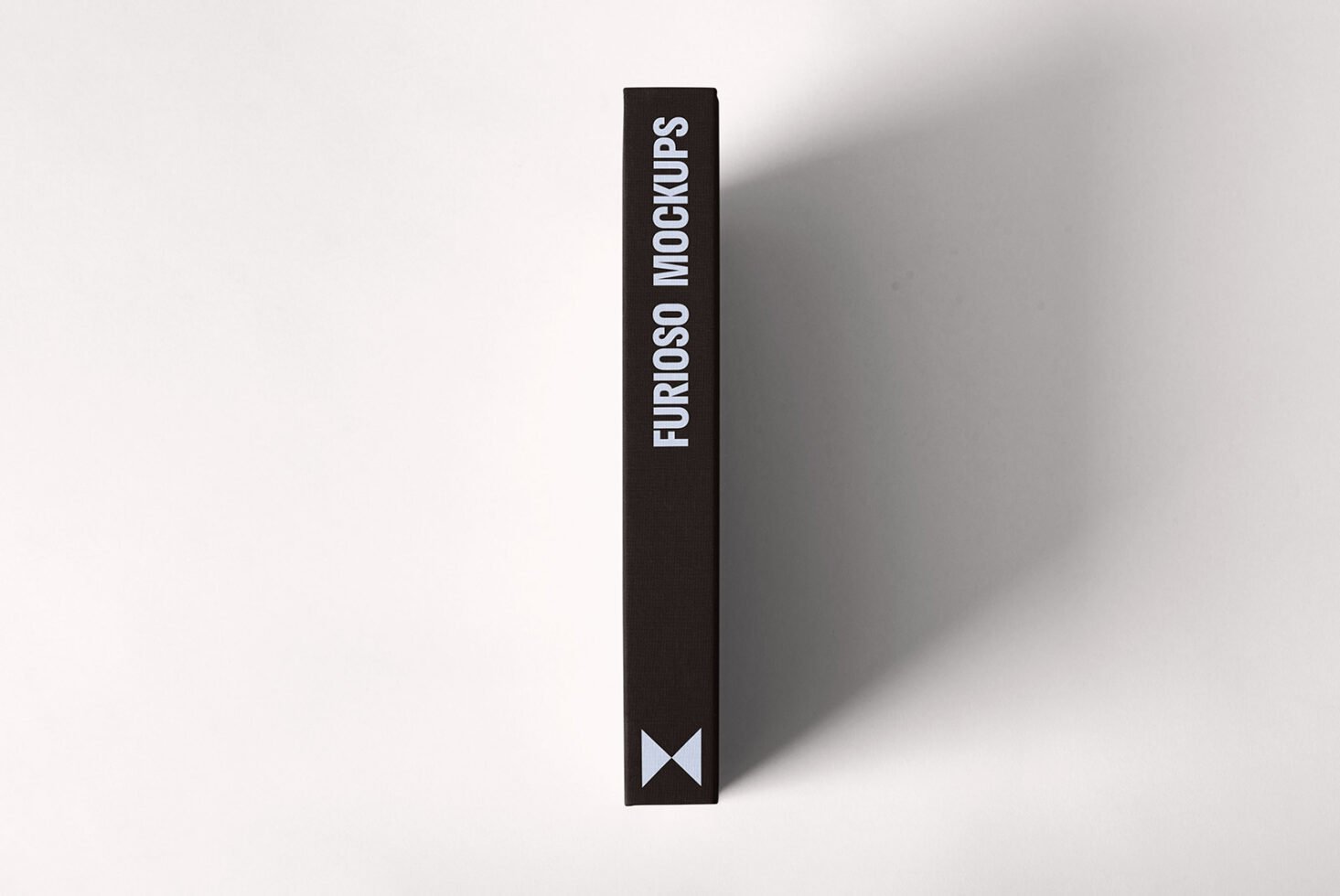Book spine mockup standing upright with title Furioso Mockups on neutral background suitable for designers. Ideal for showcasing branding designs.