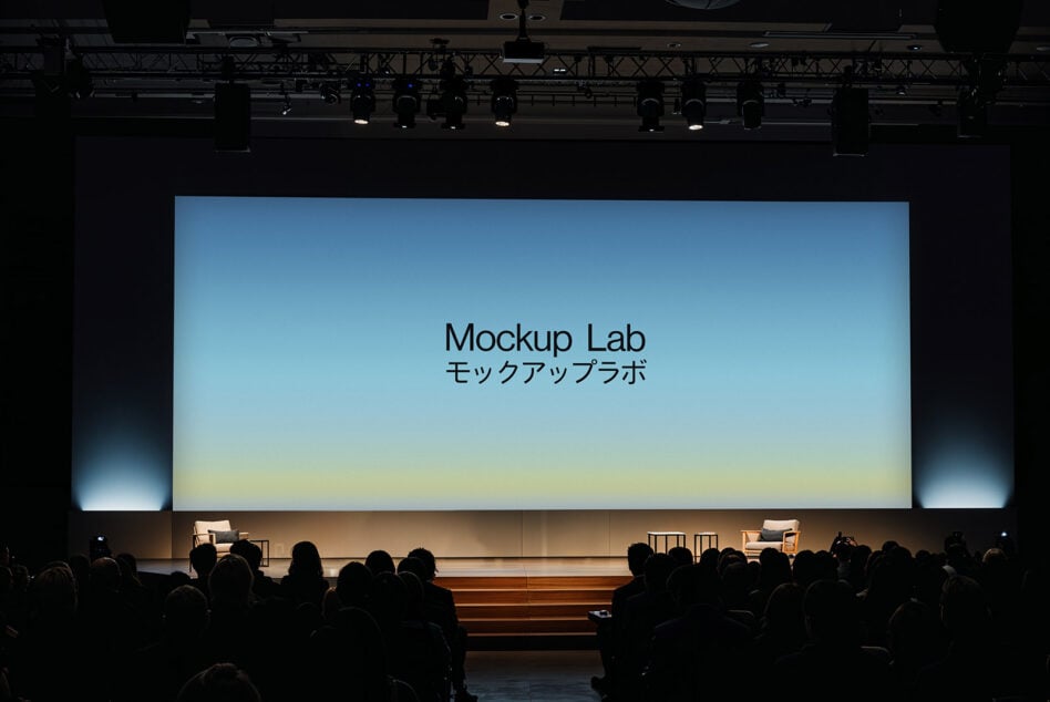Conference hall projection with sky gradient background displaying Mockup Lab to crowd