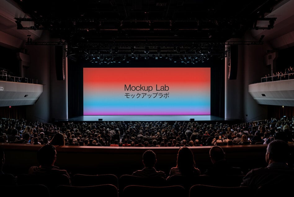 Conference stage with crowd, vibrant gradient screen displaying Mockup Lab. Ideal for designers seeking presentation graphics, creative templates, mockups.