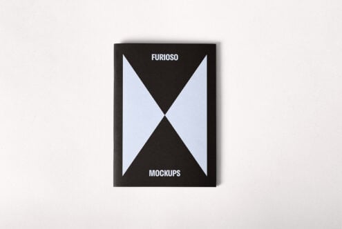 Minimal black and white brochure mockup with geometric design on cover. Ideal for designers seeking professional presentation templates and graphic assets.