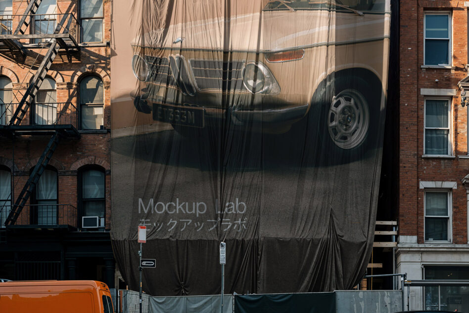 Covered sedan mockup on NYC street with brick building backdrop