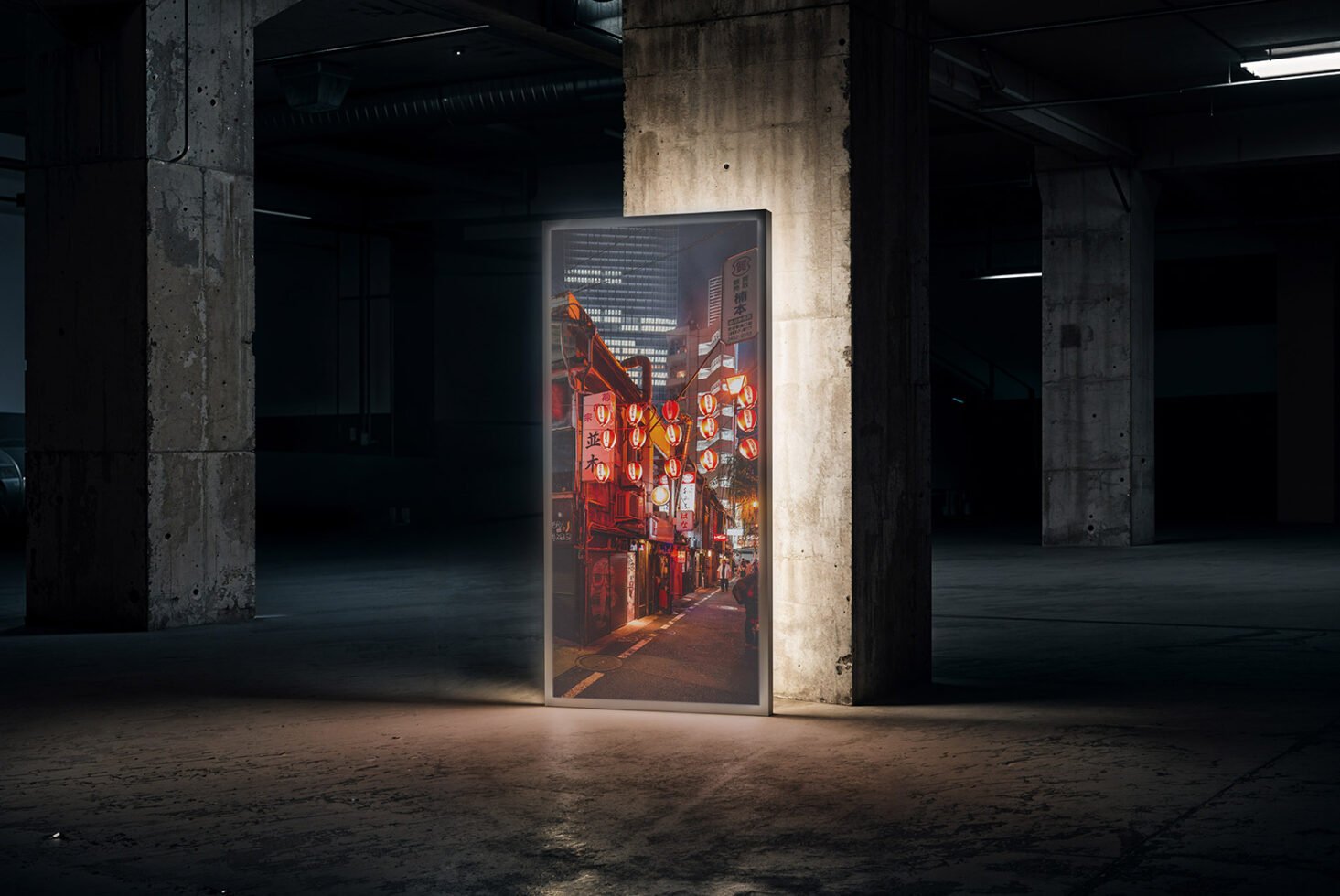 Urban poster mockup in an industrial setting with concrete pillars and a glowing billboard featuring vibrant city street art. Ideal for graphic designers.