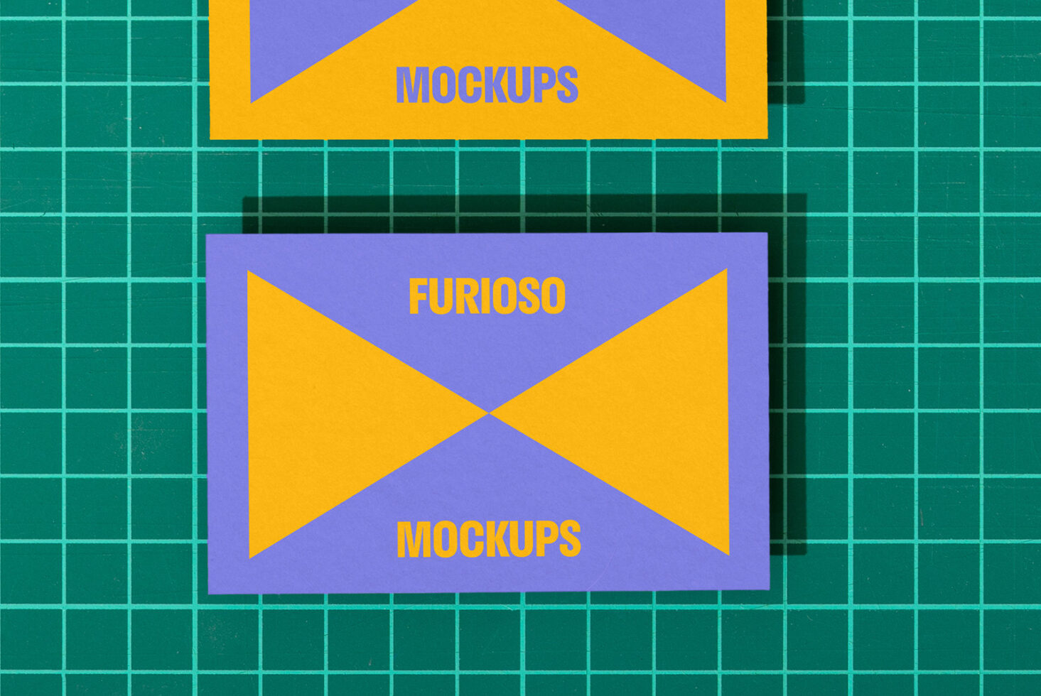 Colorful mockup design with geometric shapes on a grid background. Perfect for showcasing templates and graphics. Keywords: mockup design templates.
