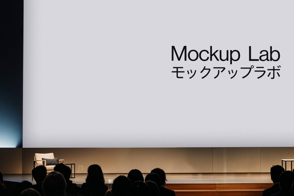 Projection screen in theater showing Mockup Lab text with seated audience silhouettes