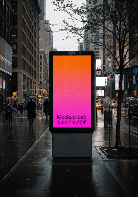 Times Square style digital kiosk displaying hot pink gradient in bustling street
