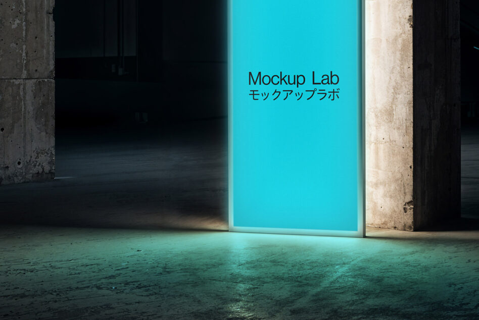 Bright turquoise illuminated panel in concrete warehouse space with Mockup Lab text