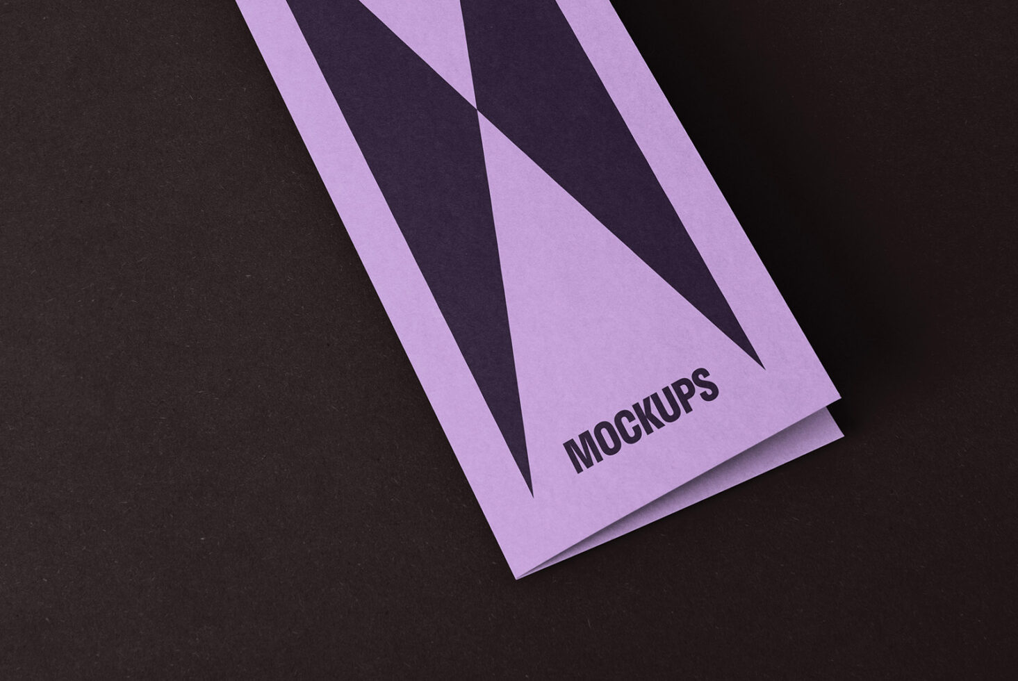 Purple mockup brochure on black background showcasing minimalist geometric design ideal for designers seeking high-quality marketing and presentation templates.