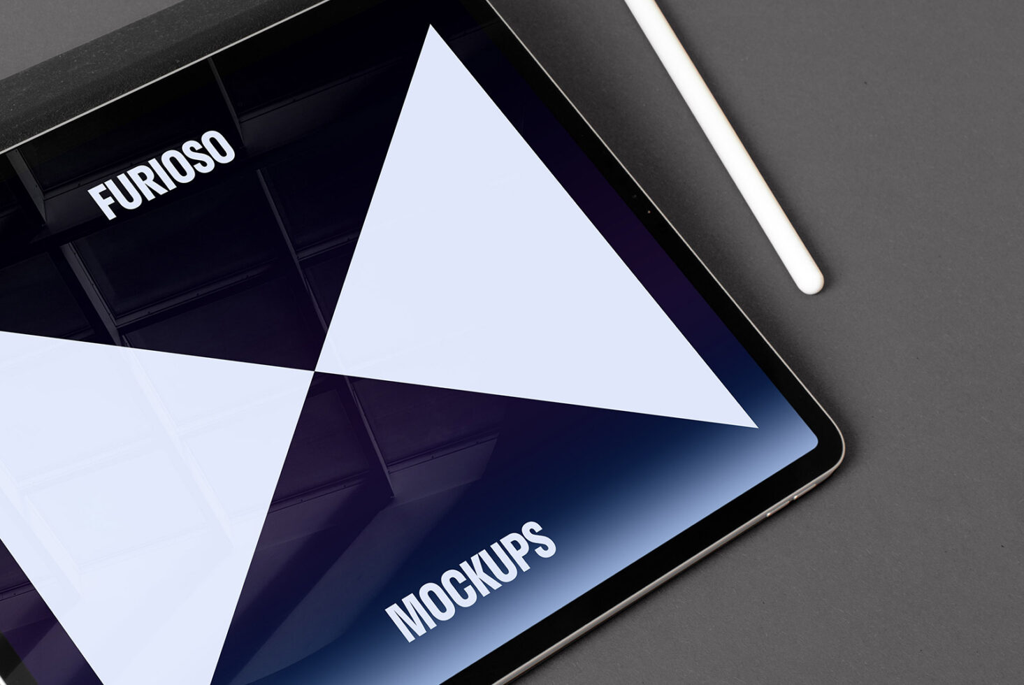 Tablet with geometric mockup design, pencil on gray background. Keywords: mockups, digital design, iPad, pencil, triangle, graphics, designer assets.