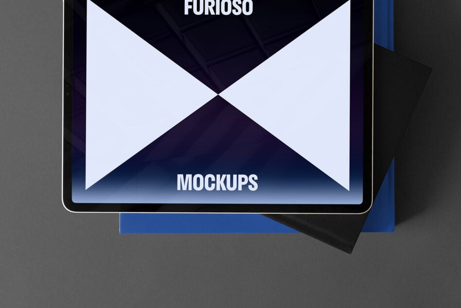 Tablet displaying Furioso mockups on a gradient background placed on blue and black books perfect for designers seeking high-quality design templates.